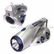 Crank Dynamo Flashlight with AM/FM Radio and mobile phone charger images