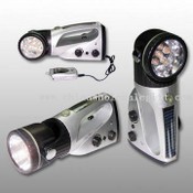 Crank Dynamo Flashlight with Radio and Mobile Phone Charger images