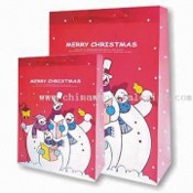 PP Carrier Bag with Merry Christmas Patterns and Red PP Strings images