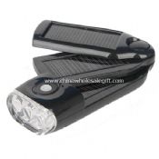 Solar Power Flashlight with Charger images