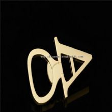 letter shape tin and wine bottle opener images