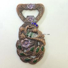 فتاحة زجاجة على شكل طاووس images