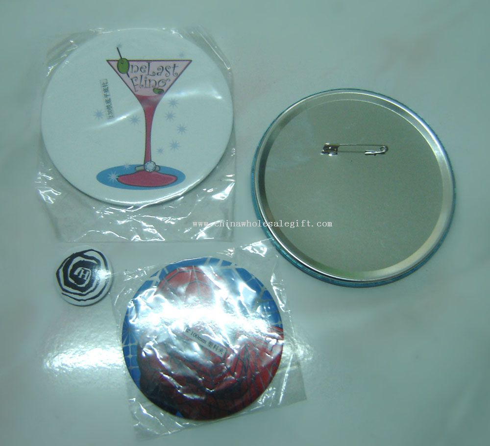 Tin badge
