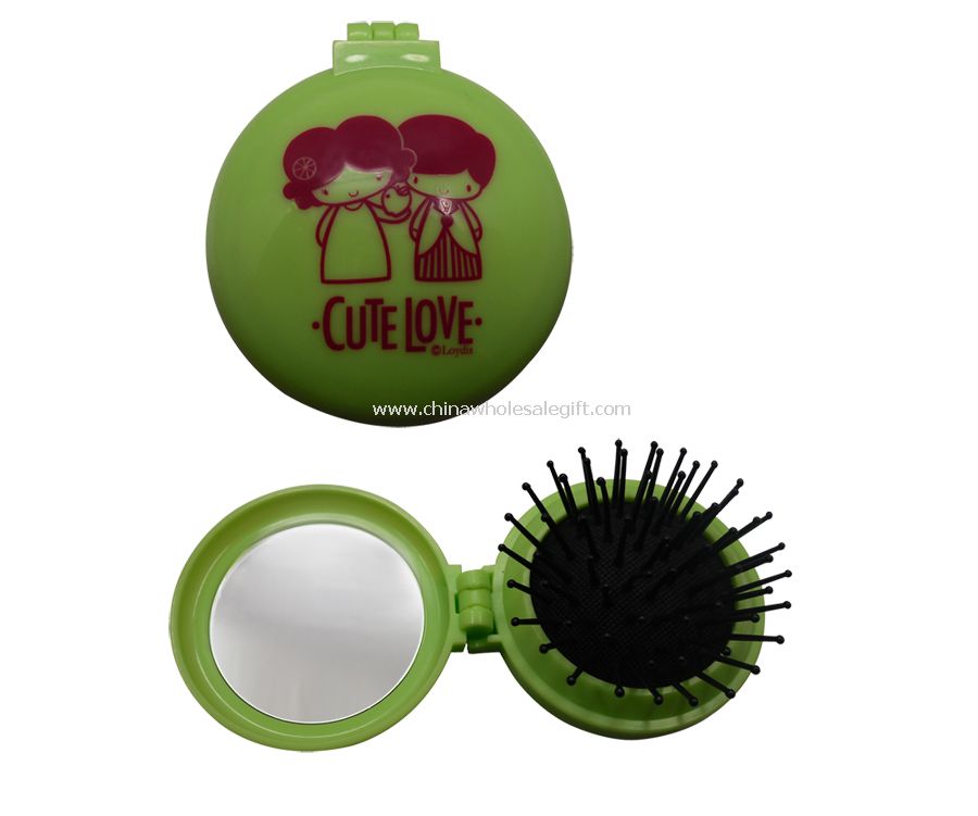 Cosmetic comb with mirror