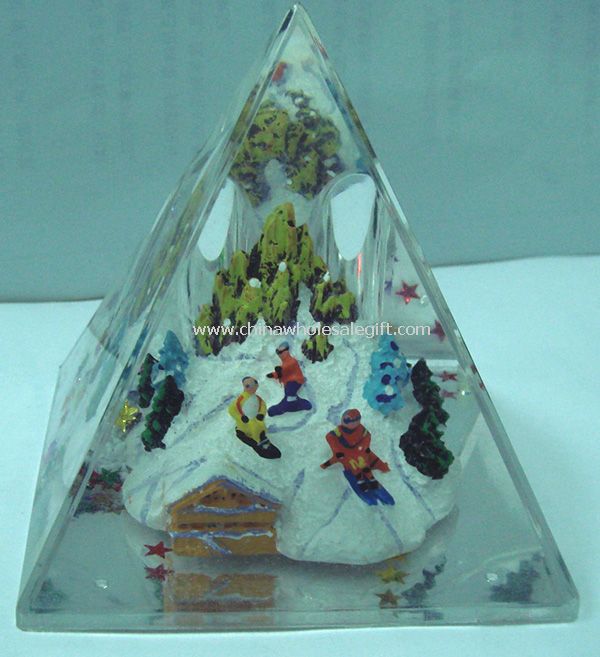 Pyramid acrylic pen inserted into the oil products