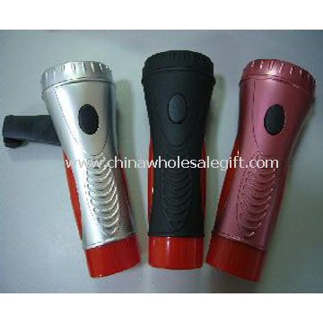 Hand crank dynamo flashlight