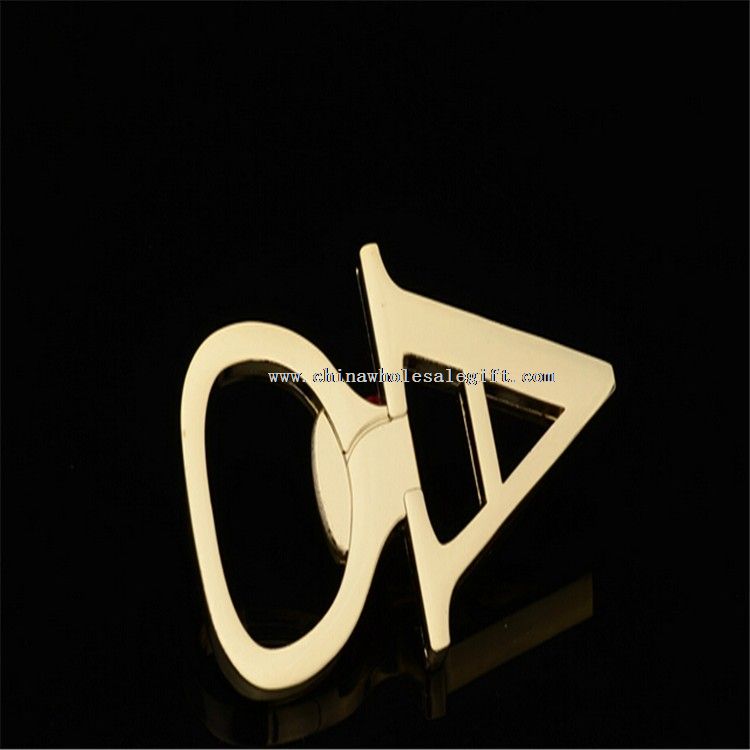 letter shape tin and wine bottle opener