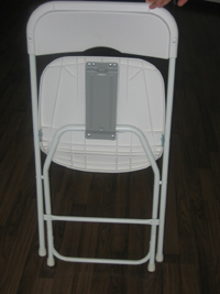 white metal-plastic folding chair