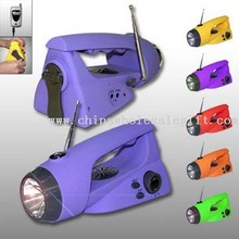 Crank Dynamo Flashlight with Radio and Mobile Phone Charger images