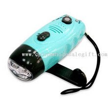 Crank Dynamo LED Flashlight with Radio and Mobile Phone Charger images