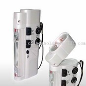 Multi-functional Crank Dynamo Flashlight with Radio and Mobile Phone Charger images