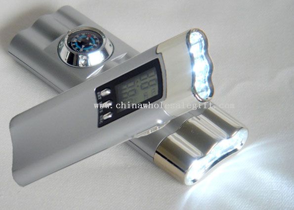 plastic flashlight with watch and compass