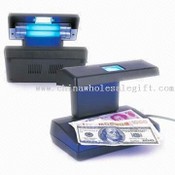 Notas e Detector de dinheiro falso images