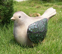 Statuetta uccello grasso con vetro