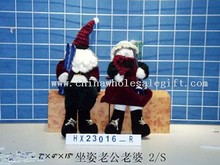 Sittingsanta Claus & Frau 2/s images