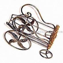 Metal Ornament with Rattan Bottle Holder images