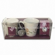 Set taza con té y galletas de mantequilla Negro images