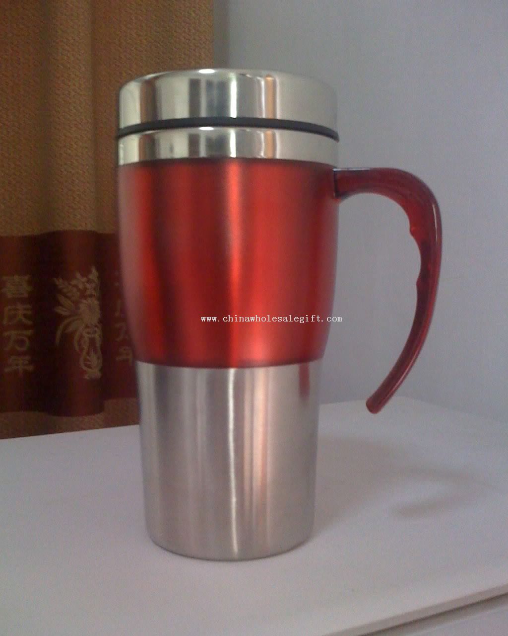 16oz stainless steel travel mug with transparent plastic outer and handle