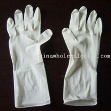 Guantes quirúrgicos estériles con superficie lisa/textura images