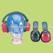 AM / FM de radio con auriculares de volumen rotativo y ajuste los controles images