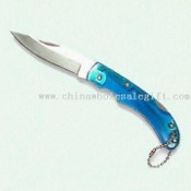 Coltello con manico in plastica traslucida pieghevole images