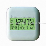 Digitalt ur med 12,7 x 12,7 x 2.7 cm dimensioner, kalender og Thermomter funktion images