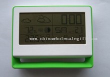 Reloj digital con estación meteorológica y calendario images