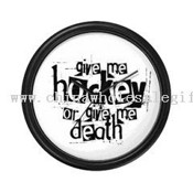 Dame de hockey. Reloj de pared images