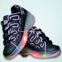 Zapatos de patinaje del rodillo images