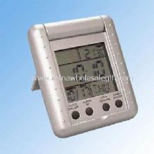 LCD Travel Alarm Clock with Calendar and Temperature Display images