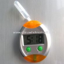 Water power LCD clock with fridge magnet images