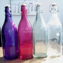 Multi color glass bottle with zinc ring and plastic top images