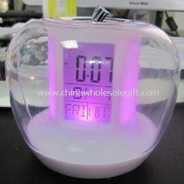 Mela a forma di orologio LCD con sette colore luce e suono della sveglia natura