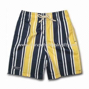 Boys Board Shorts with All-over Prints Two Side Pockets and One Rubber Badge on Right Leg