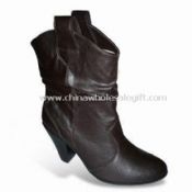 Bottes de dames de haut talon avec rides et PU supérieur images