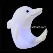Dolphin-formet lyse opp leketøy laget av plast images