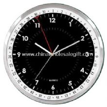 Reloj de pared de metal W/calendario images