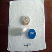 Ronde en forme de serviette de bain compressé images