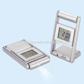 Multifunction LCD Clock Featuring with Thermometer Calendar Alarm FM Radio and Torch