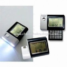 World Time Calendar with Torch and Calculator Includes Alarm Clock and Night Light images