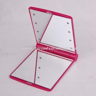 Cosmetic mirror with light