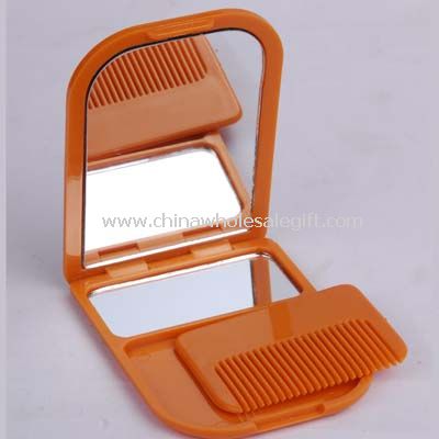 Cosmetic mirror and comb