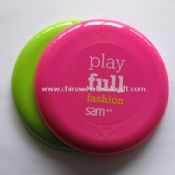 Färgglada plast frisbee images