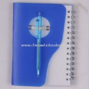 Caderno espiral com caneta images