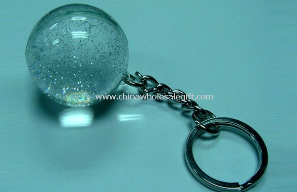 Key chain ball into the oil