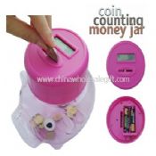 Koin menghitung uang Piggy Jar images