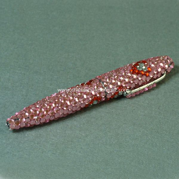 Vaaleanpunainen kristalli kynä