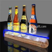 Exhibición de LED vino con pedestal de madera images