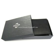 Caja de regalo de color negro y plata sellado para usar presente poniendo caliente images