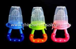 Silicone baby feeder with caps images